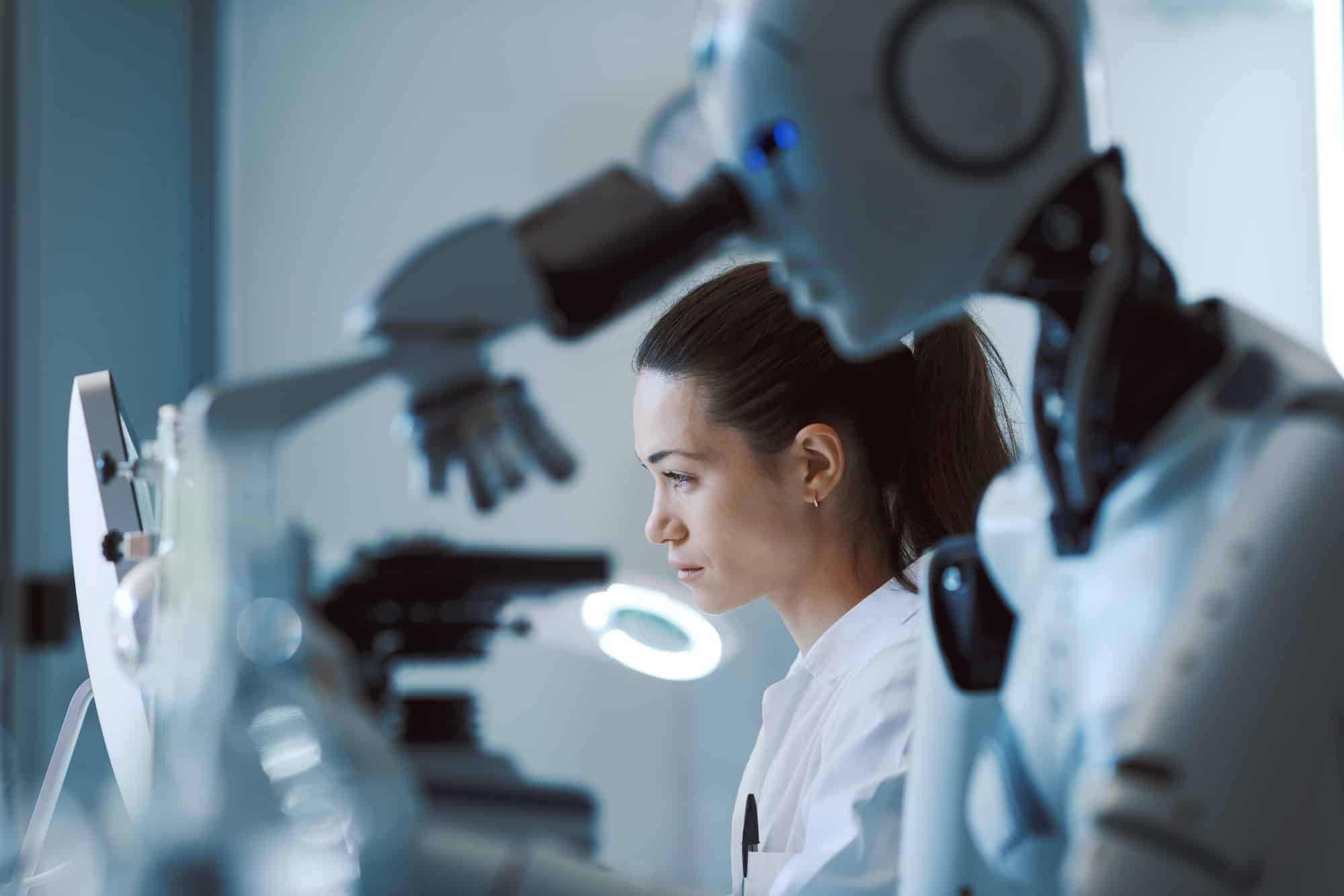 AI robot examining samples under a microscope