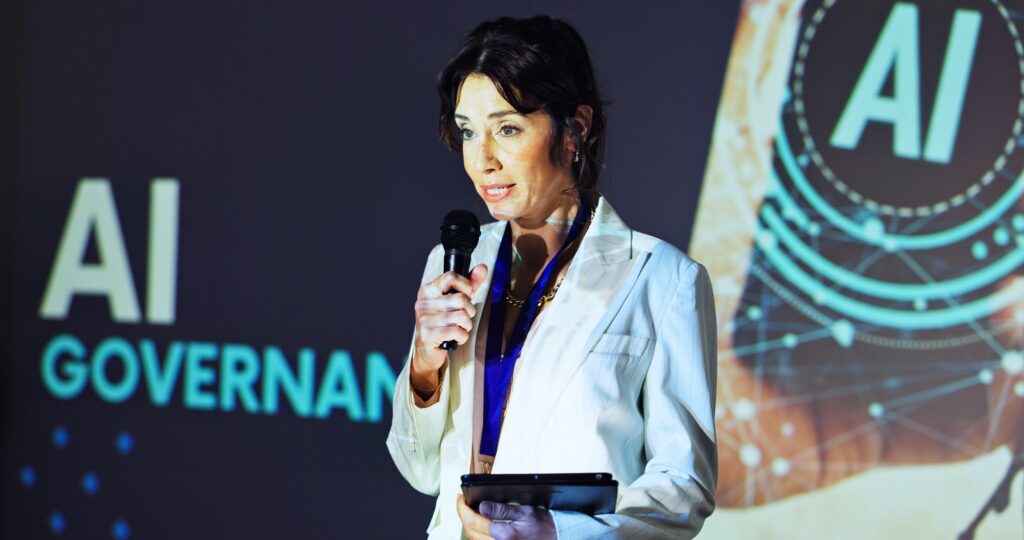 Woman, speech and artificial intelligence at conference, stage or tablet for notes, compliance and